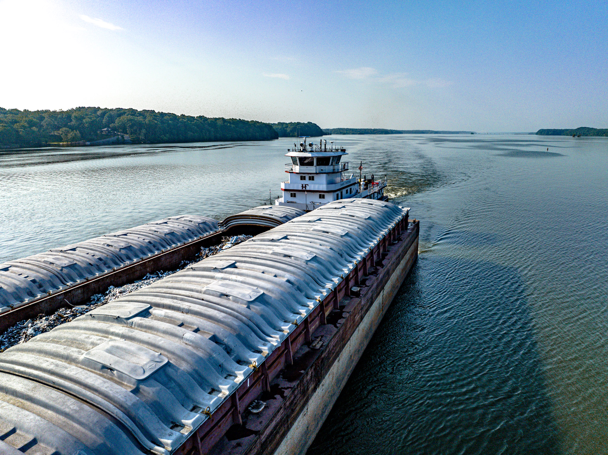 Hines Furlong Line towboat pushing dry cargo barges on inland waterway